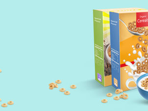 A cereal box display with a bowl of cereal.