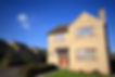 Large modern detached house with oak effect leaded windows