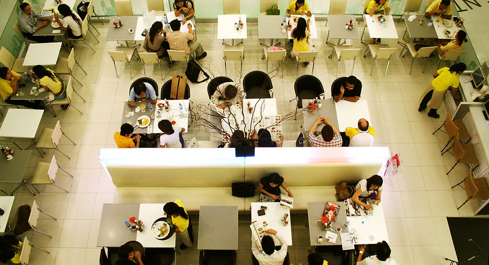 Many people eating in the restaurant