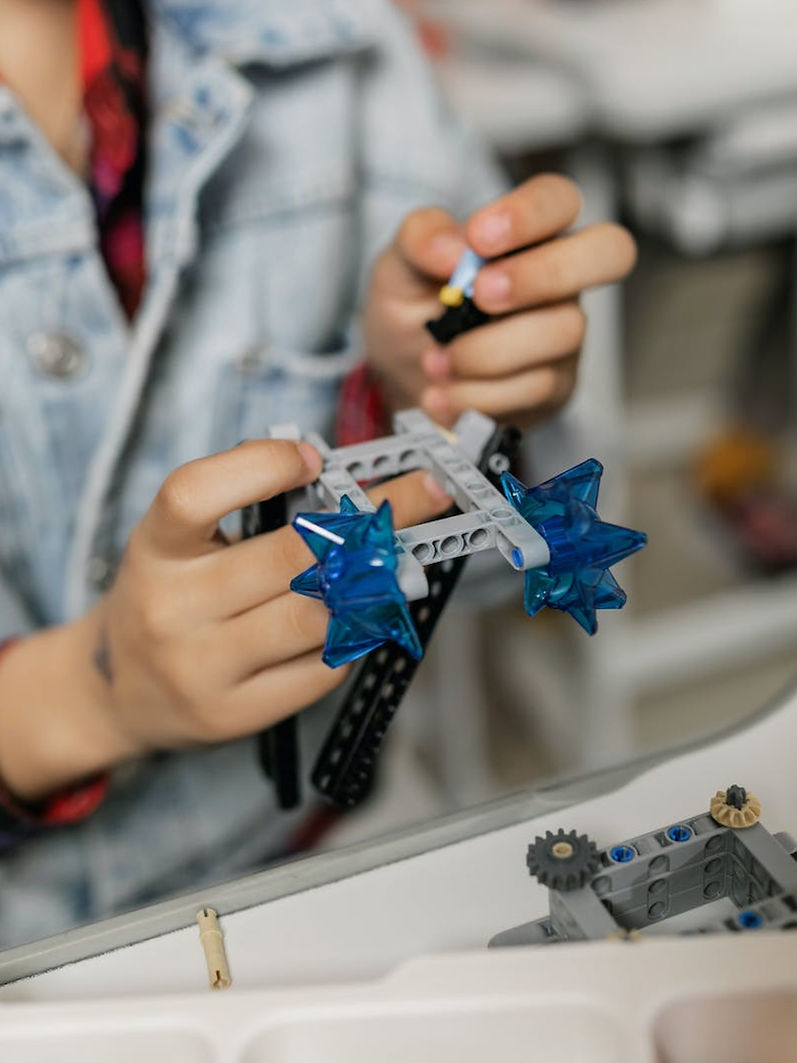 Child Building Lego