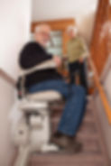 Cheerful Seniors with Stairlift: Assisted Living