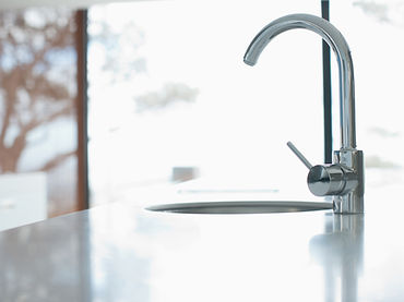 Kitchen tap in modern home