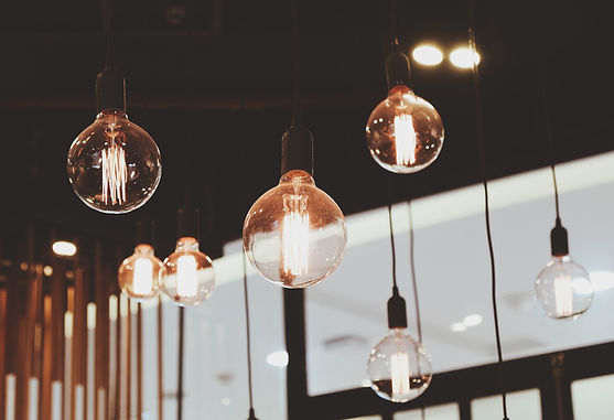Low Angle View Of Illuminated Light Bulbs