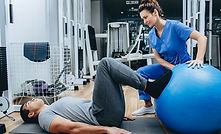 A person gradually returning to movement while their nervous system, muscles and joints adapt during recovery from persistent pain.