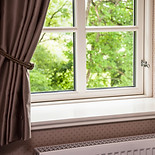 Window with view of summer backyard