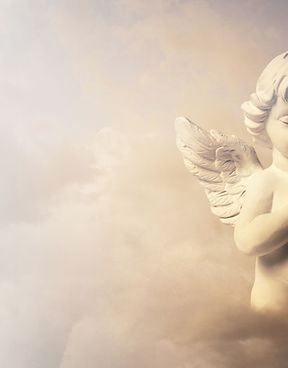 Angel Statue in Clouds