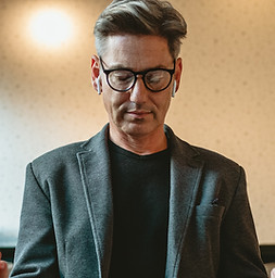 Man Meditating Indoors