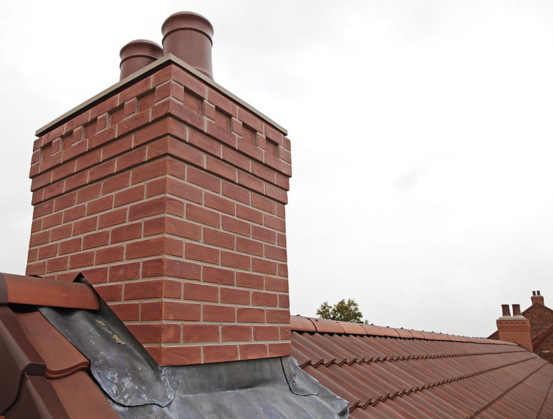Brick chimney on rooftop