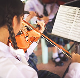 Play the violin