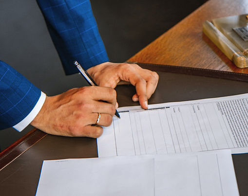 A person signing a contract