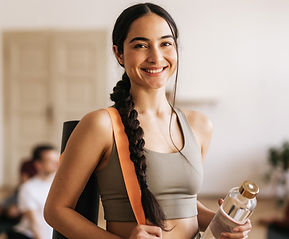 Woman Holding Yoga Mat