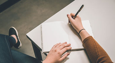 Writing on a Notebook