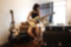 electric guitar player female