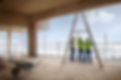 Construction workers at highrise construction site