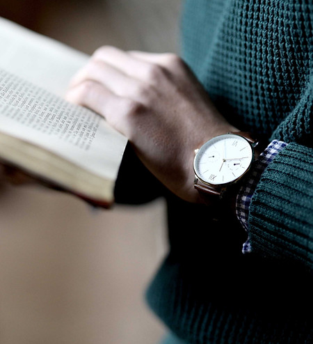 a client reading their finished memoir after using WordMatters ghostwriting services