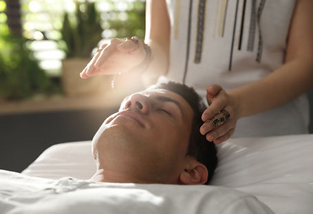 Professional reiki healing session for deep relaxation and balance