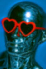 Metallic mannequin head with swirling blue reflections, wearing bold red heart-shaped sunglasses against a blue background. Futuristic vibe.