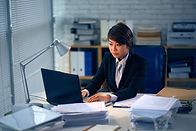 Young Vietnamese intern lawyer busy with work