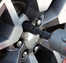 Screwing Car Wheel