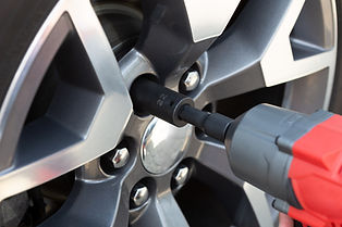 Screwing Car Wheel