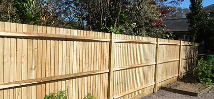  A view of a wooden shiplap boundary fence