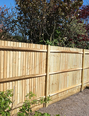 New wooden boundary fence with shiplap panels