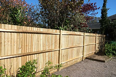 Brand-new wooden shiplap boundary fence