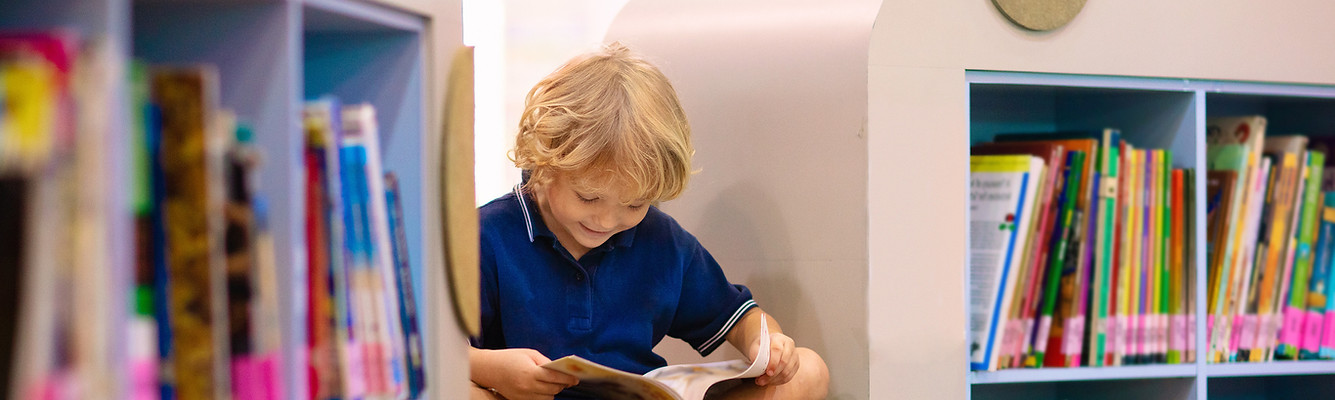 Child Reading Book