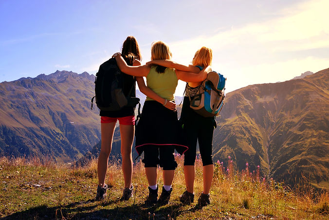 People standing on mountain side