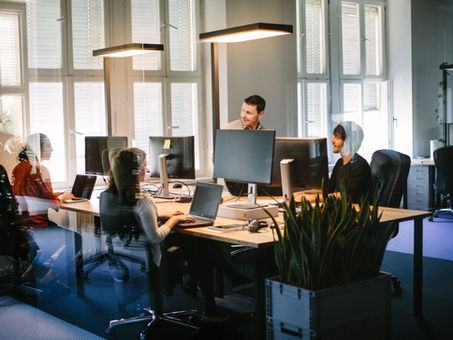 People gathering in an modern office 