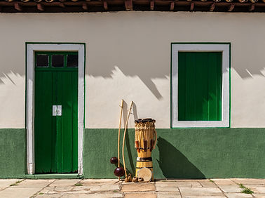 Capoeira Instruments next to a door and a window.