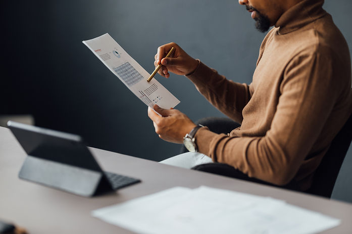 Man Reviewing Document