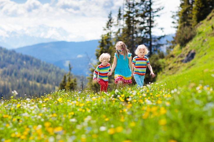 Siblings hiking in the mountains