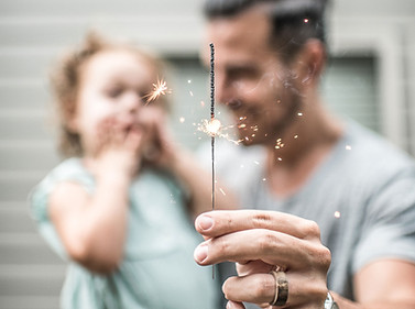 Father and Daughter with Sparkler