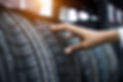 Hand finger checking tyre
