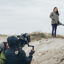 What are the opportunities from film and movie location tourism? Film and television have the unique ability to bring places to life, shaping the way audiences around the world see destinations. Locations featured in popular films can become tourism hotspots overnight. More than just a temporary surge, these sites often experience long-term benefits that extend to branding, marketing, employment, and infrastructure. From sweeping landscapes captured on screen to quaint towns turned famous by a single scene, film tourism can be a powerful economic engine for local economies. The connection between a cinematic location and tourist interest can transform obscure areas into thriving attractions, while also giving destinations a memorable brand identity. Towns, cities, remote regions should consider how they can leverage the unique economic opportunities that film, television and other media can offer.   The draw of cinematic destinations What makes film tourism so compelling is the emotional connection viewers develop with stories and characters. Seeing a place on screen can spark a desire to visit, often with a sense of familiarity and curiosity. When tourists visit locations they recognise from films or shows, their travel is driven not just by scenery, but by the desire to relive moments from the story. This translates into increased visitor numbers, longer stays, and higher spending. The example of New Zealand following the release of The Lord of the Rings  trilogy shows just how powerful this can be. Inbound tourism rose by 40% between 2000 and 2006, far outpacing regional averages. Locations such as Hobbiton became permanent tourist attractions, creating jobs and supporting local businesses. In the UK, locations from the Harry Potter  series continue to attract fans from around the world, often increasing visitor numbers by 50% or more. Economic benefits beyond visitor numbers The financial benefits of film tourism go far beyond simple visitor counts. Tourists visiting film sites often spend more, stay longer, and seek immersive experiences. This supports hospitality, retail, transport, and local service providers. For example, Middle-earth fans travelling to New Zealand reportedly spent significantly more than the average tourist, boosting national revenue. Job creation is another major benefit. A successful film tourism site can employ hundreds of people directly and indirectly. At Hobbiton, up to 280 staff were employed pre-COVID, and the surrounding area saw the growth of accommodation, dining, and transport businesses. The demand for tour guides, interpreters, merchandise vendors, and maintenance services provides employment opportunities for residents, especially in regional areas. Film tourism also stimulates infrastructure development. Roads, signage, visitor centres, and digital platforms often receive investment to support increased tourist demand. This can enhance access and quality of life for local communities as well. Cultural and branding advantages Films shape the public perception of destinations, often more powerfully than traditional advertising. A well-loved movie can elevate a location into a globally recognised brand. Campaigns like "100% Middle-earth, 100% Pure New Zealand" cleverly linked the country's natural beauty with its cinematic identity. These campaigns don't just attract film tourists; they create a long-lasting, positive brand association. Destinations can use their film ties to highlight culture, heritage, and natural beauty. This reinforces local identity and helps preserve historical sites by making them economically valuable. In India, films shot in Rajasthan, and Ladakh have brought national and international attention to these culturally rich regions, supporting both tourism and pride in local heritage. Modern marketing and digital potential With the rise of digital media, the marketing of film tourism has become more dynamic. Campaigns now include social media, user-generated content, and augmented reality. Hashtags like #IfYouSeek encourage fans to share their experiences, spreading awareness organically. Platforms like TikTok and Instagram help destinations reach younger travellers who are influenced by short, engaging content. Tourism boards and film commissions are also forming closer partnerships with production companies. Agreements often include rights to use film footage in promotional content, as seen in the deals made for The Hobbit  and Avatar  films. These collaborations ensure tourism messages are woven into film marketing from the start, amplifying the impact. Challenges and considerations Despite its benefits, film tourism requires careful management. Overcrowding, environmental damage, and cultural disruption can result if sites are not prepared for surges in visitor numbers. Dubrovnik, featured in Game of Thrones , had to implement visitor limits to preserve its historic core. Successful film tourism strategies must include sustainability measures, community involvement, and long-term planning. There is also the risk of becoming overly reliant on a single film or series. Diversification is key. Some destinations offer tours that cover multiple films or themes, or they develop broader attractions beyond the original filming location. Investment in visitor experience, such as interactive exhibitions or themed events, can help maintain interest. Recommendations for destinations interested in film tourist To unlock the full potential of film tourism, destinations should: Form partnerships with film producers early  to secure marketing rights and coordinate promotional efforts. Invest in infrastructure  to ensure visitor readiness and benefit local residents. Develop themed experiences , such as guided tours, festivals, or attractions, that bring the film to life. Build sustainable tourism plans  that manage crowds, protect sites, and involve local communities. Encourage targeted support schemes , offering tailored financial benefits to those developing film-related infrastructure. Simplify travel logistics for film crews , through discounted fares, streamlined transport, and accommodation arrangements. Promote destination readiness  by supporting necessary physical improvements, especially in underdeveloped or lesser-known areas. Bundle experiences  that link shooting locations with studio tours or behind-the-scenes elements to add value for tourists. Streamline compliance  by reducing red tape and creating a more welcoming environment for production teams. Foster international appeal  through major showcases, festivals, or creative meetups that spotlight locations and attract fans and professionals. Support complementary sectors , including costume design, catering, and local crafts, to maximise the economic ripple effect. Embrace immersive technology  to enhance visits, offering virtual reality, interactive maps, or on-location digital overlays. Use targeted social media strategies  that build authentic interest in film locations and attract niche communities. Conclusion Film and movie location tourism is more than a passing trend; it's a meaningful way to bring stories to life while generating real-world benefits. By tapping into the emotional pull of cinema, destinations can unlock significant economic opportunities, strengthen their identity, and engage visitors in powerful ways. From rural towns to bustling cities, the next blockbuster might just be the key to a tourism boom. The challenge now is not just to attract film productions, but to build a sustainable, engaging, and community-friendly model of tourism that lasts long after the credits roll.