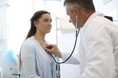 Integrative primary care physician consulting with a patient inGrand Rapids, MI