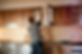 A carpenter working on new kitchen cabinets