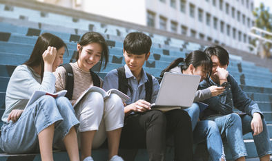 Students Chatting On Stairs