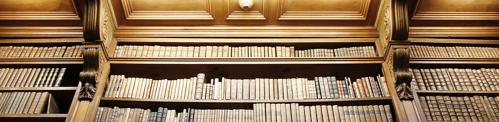 Shelves of old bound volumes in a historic library