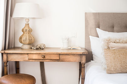 table nightstand next to bed