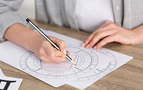 Astrologer Writing Natal Chart
