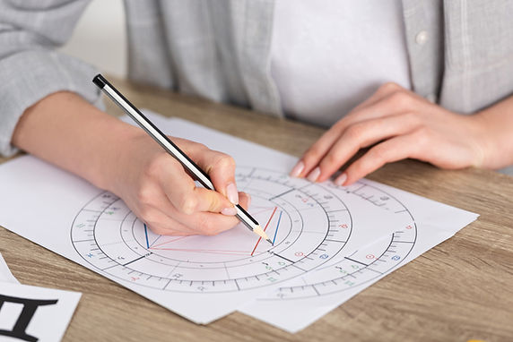 Astrologer Writing Natal Chart