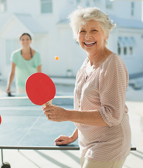Family Playing Table Tennis