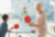 Family Playing Ping Pong