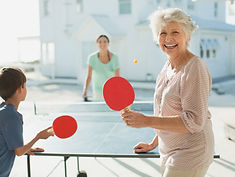 Family Playing Table Tennis