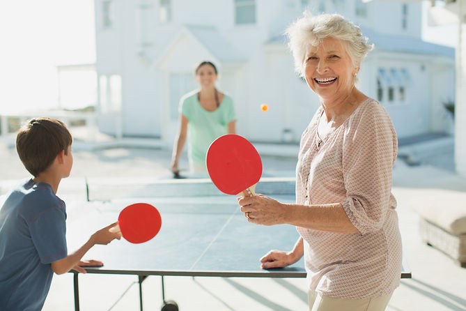 Family Playing Table Tennis