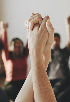 Holding Hands Up High
