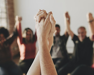 Holding Hands Up High