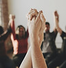 Holding Hands Up High